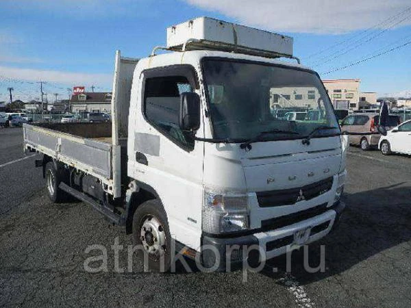 Фото Грузовик бортовой MITSUBISHI CANTER кузов FEB80 гв 2012 багажник грузопод 3,5 тн пробег 64 т.км