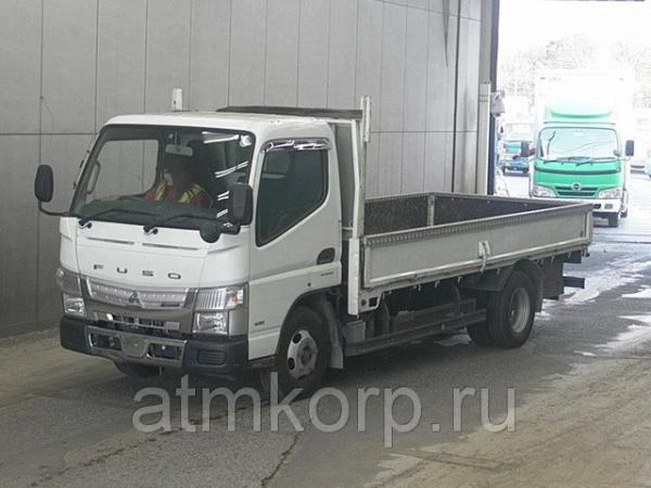 Фото Грузовик бортовой MITSUBISHI CANTER кузов FEA20 год выпуска 2012 грузоподъемность 2 тонны пробег 61 тыс км