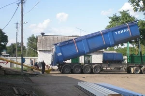 Фото Самосвальный полуприцеп с лючками и желобом для перевозки зерна