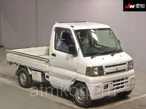 Фото Микрогрузовик бортовой MITSUBISHI MINICAB TRUCK гв 2011 полный привод 4х4 груз 0,35 тн пробег 193 т.км