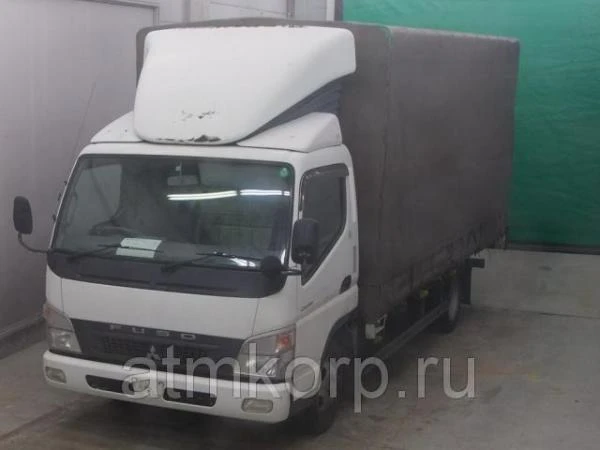 Фото Грузовик бортовой тентованный MITSUBISHI CANTER кузов FE82D гв 2008 грузопод 2 тн пробег 270 т.км