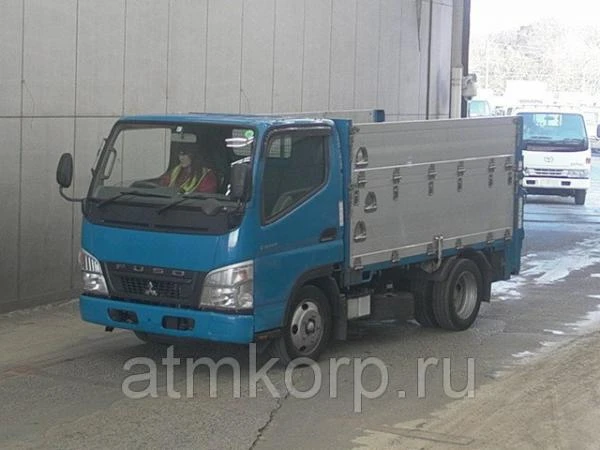 Фото Грузовик бортовой MITSUBISHI CANTER кузов FE70B гв 2008 гидроборт грузоподъемность 2 тонны пробег 154 т.км