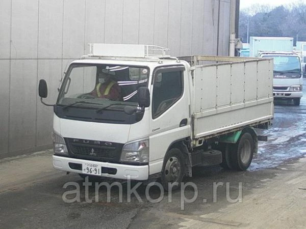 Фото Грузовик бортовой MITSUBISHI CANTER кузов FE70D гв 2008 багажник грузопод 2 тн пробег 146 т.км