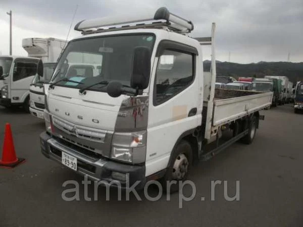 Фото Грузовик бортовой MITSUBISHI CANTER кузов FEB90 гв 2012 багажник грузопод 4 тн пробег 211 т.км