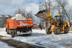 фото Уборка территории от снега. Самосвалы, погрузчики