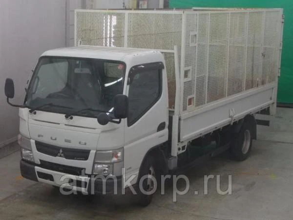 Фото Грузовик бортовой MITSUBISHI CANTER кузов FEA50 год выпуска 2012 грузоподъемность 2 тонны пробег 57 тыс км