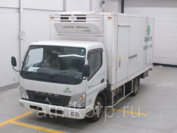 Фото Авторефрижератор MITSUBISHI CANTER 2010 груз 2,9 т объем 19,62 куб м двухсторонняя разгрузка пробег 373 т.км