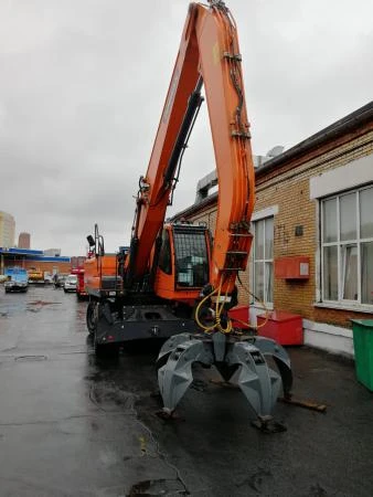 Фото DOOSAN DX210WA перегружатель