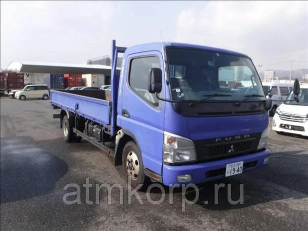 Фото Грузовик бортовой MITSUBISHI CANTER кузов FE82D год выпуска 2009 грузоподъемность 3 тонны пробег 162 тыс км