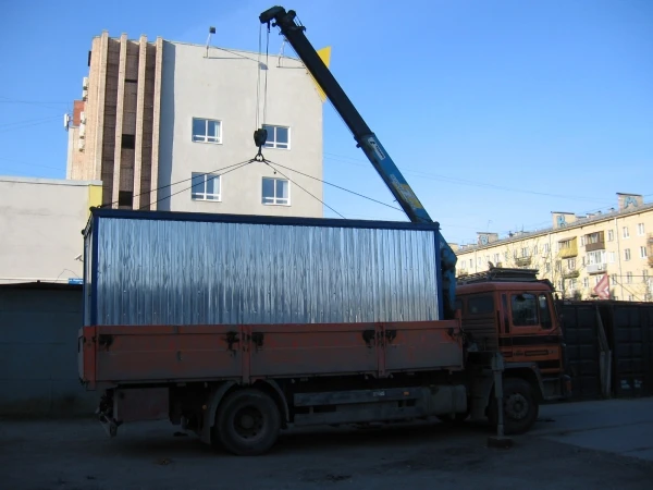 Фото Бытовки доставка с разгрузкой манипулятором Спб