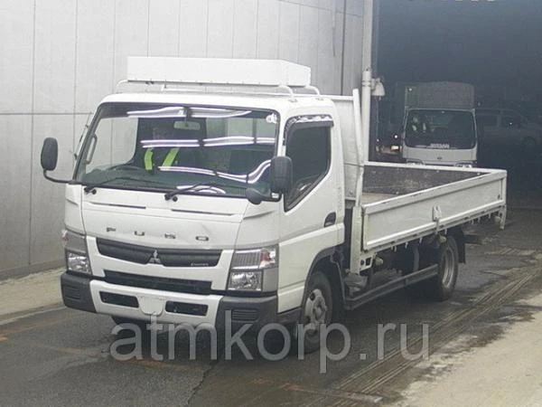 Фото Грузовик бортовой MITSUBISHI CANTER кузов FEB50 год вып 2011 багажник грузоподъемность 2 тонны пробег 323 т.км