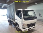 фото Грузовик бортовой тентованный MITSUBISHI CANTER кузов FE70B гв 2009 грузоподъемность 2 тн пробег 165 т.км