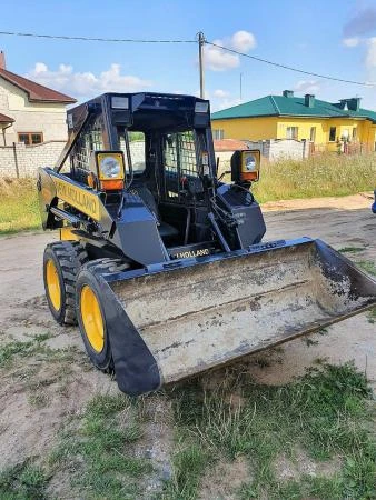 Фото Мини-погрузчик New Holland LS150