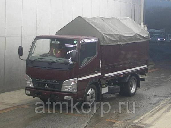 Фото Грузовик бортовой тентованный MITSUBISHI CANTER кузов FE70B гв 2009 грузоподъемность 2 тн пробег 211 т.км