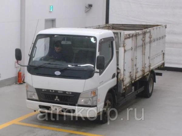 Фото Грузовик бортовой MITSUBISHI CANTER кузов FE74DV год выпуска 2008 грузоподъемность 2 тн пробег 461 т.км