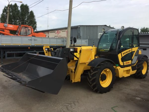 Фото Телескопический погрузчик New Holland LM1345