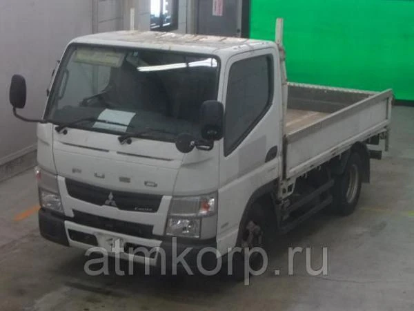 Фото Грузовик бортовой MITSUBISHI CANTER кузов FBA20 год выпуска 2012 грузоподъемность 2 тонны пробег 92 тыс км