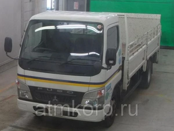 Фото Грузовик бортовой MITSUBISHI CANTER кузов FE72D гв 2009 гидроборт грузопод 3 тн пробег 239 т.км