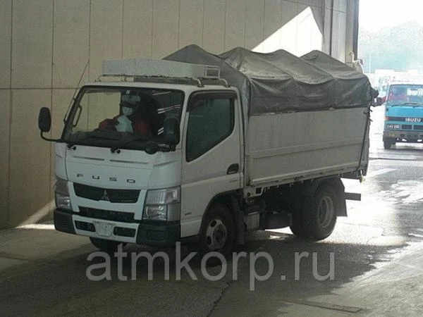 Фото Грузовик бортовой тентованный MITSUBISHI CANTER кузов FBA20 гв 2011 багажник грузопод 2 тн