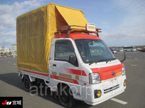 Фото Микрогрузовик SUBARU SAMBAR Truck кузов TT2 тент бортовой гв 2010 4 wd пробег 127 т.км белый