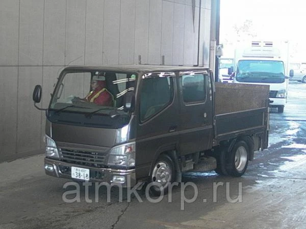 Фото Грузовик двухкабинник бортовой MITSUBISHI CANTER гв 2009 гидроборт кабина 6 м груз 2 т пробег 62 т.км