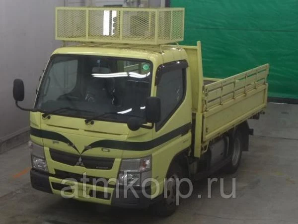 Фото Грузовик бортовой MITSUBISHI CANTER кузов FEA53 гв 2012 багажник грузопод 3 тн пробег 81 тыс км