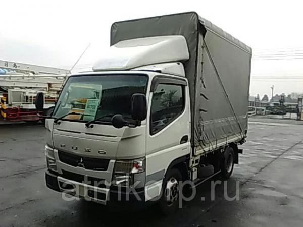 Фото Грузовик бортовой тентованный MITSUBISHI CANTER кузов FBA20 год выпуска 2012 грузопод 2 тн пробег 139 т.км