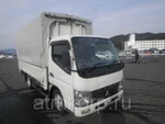 фото Грузовик бортовой тентованный MITSUBISHI CANTER кузов FE72BS гв 2010 грузоподъемность 2 тн пробег 65 т.км