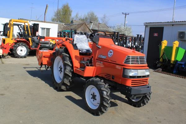 Фото Японский мини трактор Kubota X20D