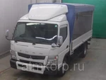 фото Грузовик бортовой тентованный MITSUBISHI CANTER кузов FEB90 гв 2011 гидроборт груз 4,1 тн пробег 270 т.км