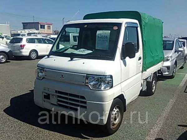 Фото Микрогрузовик бортовой тентованный MITSUBISHI MINICAB TRUCK кузов U61T гв 2012 груз 0,35 тн пробег 95 т.км