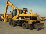 фото Перегружатель CATERPILLAR M322CMH