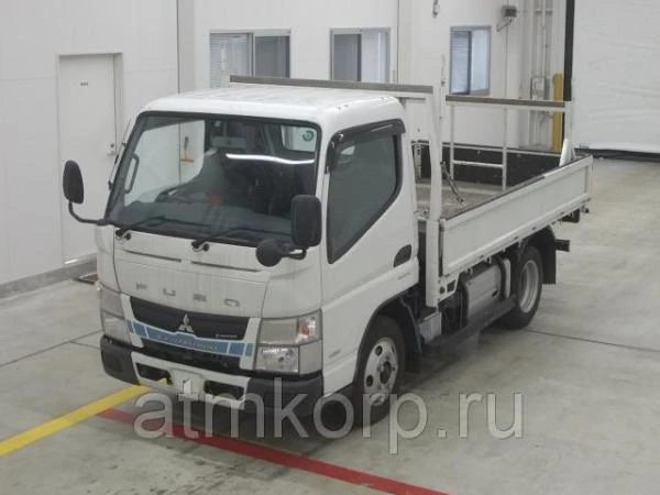 Фото Грузовик бортовой MITSUBISHI CANTER кузов FEA53 год выпуска 2012 грузоподъемность 2 тонны пробег 38 тыс км