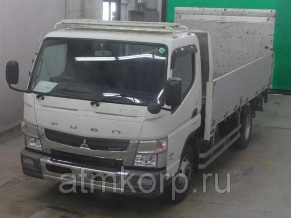 Фото Грузовик бортовой MITSUBISHI CANTER кузов FEB90 гв 2011 гидроборт грузопод 4 тн пробег 92 т.км