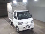 фото Микрогрузовик бортовой тентованный MITSUBISHI MINICAB TRUCK кузов U61T гв 2012 груз 0,35 тн пробег 153 т.км