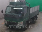 фото Грузовик бортовой MITSUBISHI CANTER кузов FE70B год выпуска 2009 грузоподъемность 2 тонны пробег 369 тыс км