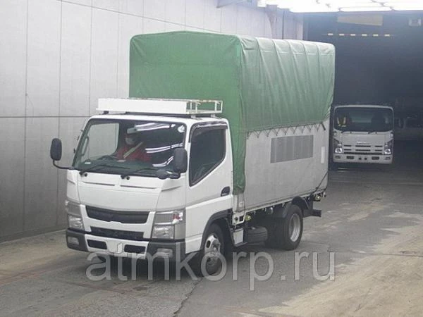 Фото Грузовик бортовой тентованный MITSUBISHI CANTER кузов FBA20 гв 2012 багажник грузопод 2 тн пробег 190 т.км