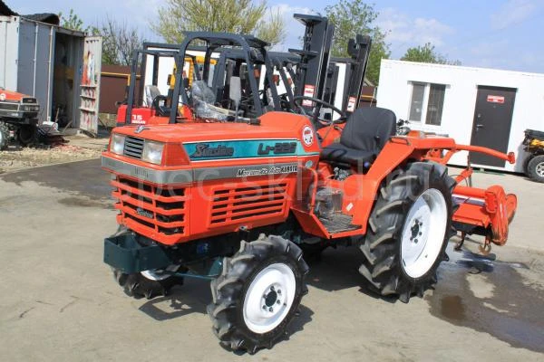 Фото Японский мини трактор KUBOTA L1-225D