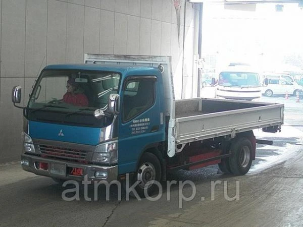 Фото Грузовик бортовой MITSUBISHI CANTER кузов FE83DY год выпуска 2010 грузоподъемность 3,8 тонны пробег 167 т.км