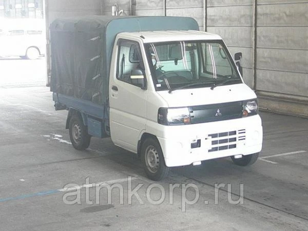 Фото Микрогрузовик бортовой тент MITSUBISHI MINICAB TRUCK кузов U61T гв 2009 груз 0,35 тн пробег 103 т.км