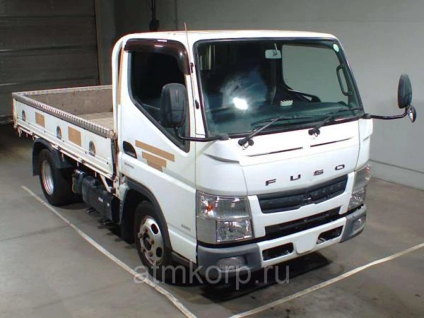 Фото Грузовик бортовой MITSUBISHI CANTER кузов FBA20 год выпуска 2011 грузоподъемность 2 тонны пробег 321 тыс км