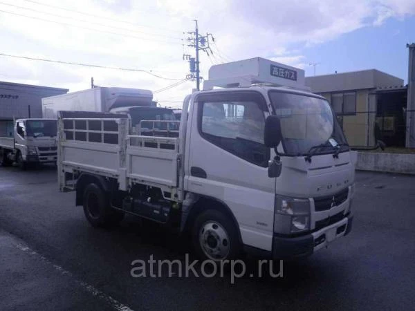 Фото Грузовик бортовой MITSUBISHI CANTER кузов FEA50 гв 2012 гидроборт багажник грузопод 3 тн пробег 38 т.км