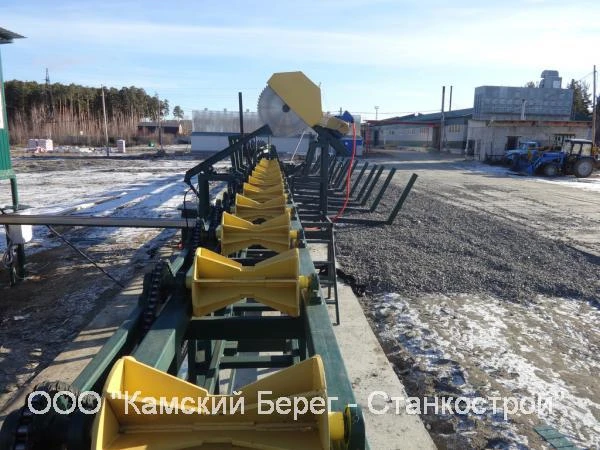 Фото Линия раскряжевки брёвен.