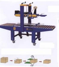 Фото Аппараты для заклейки коробок скотчем