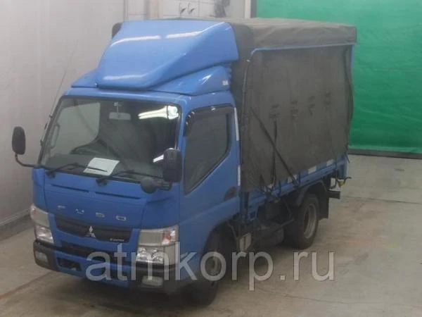 Фото Грузовик бортовой тентованный MITSUBISHI CANTER кузов FEA50 год выпуска 2012 грузопод 2 тн пробег 384 т.км