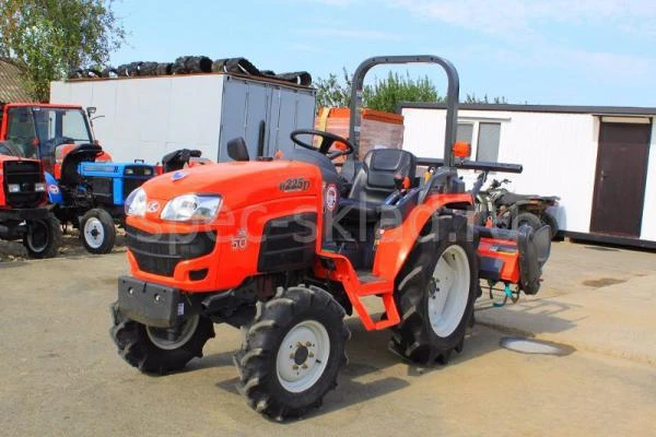 Фото Японский мини трактор Kubota B225D