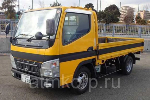 Фото Грузовик бортовой MITSUBISHI CANTER кузов FB70B год выпуска 2009 грузоподъемность 1,5 тонны пробег 60 тыс км