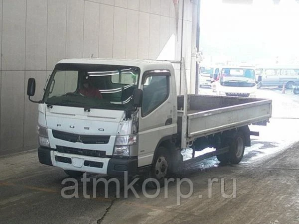 Фото Грузовик бортовой MITSUBISHI CANTER кузов FEB50 год выпуска 2012 грузоподъемность 2 тонны пробег 75 тыс км