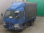 фото Грузовик бортовой тентованный MITSUBISHI CANTER кузов FEA50 год выпуска 2012 грузопод 2 тн пробег 384 т.км