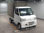 фото Микрогрузовик бортовой тентованный MITSUBISHI MINICAB TRUCK кузов U61T гв 2012 груз 0,35 тн пробег 24 т.км